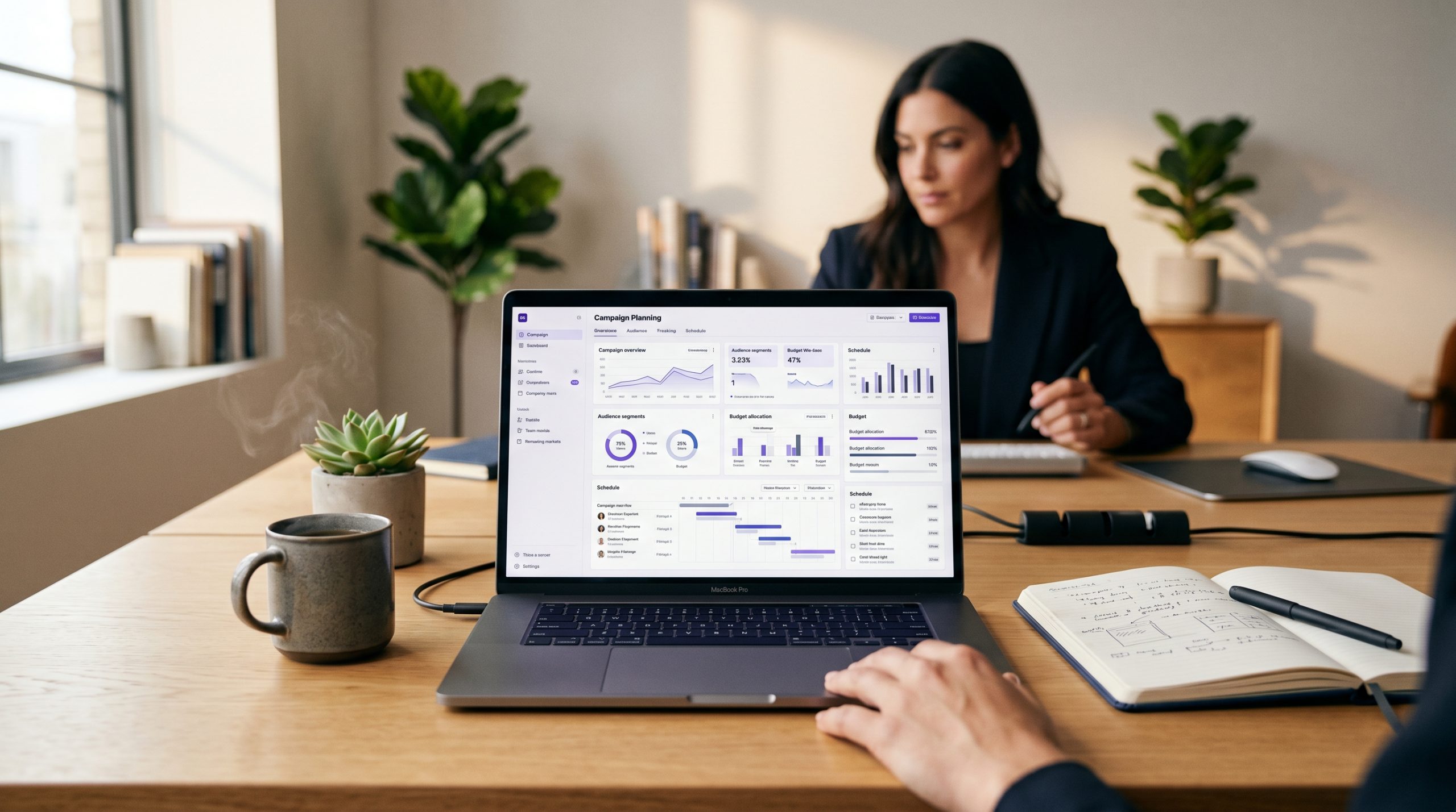 A founder's desk showing a laptop with a marketing dashboard, illustrating how to use AI campaign planning for strategic automation.
