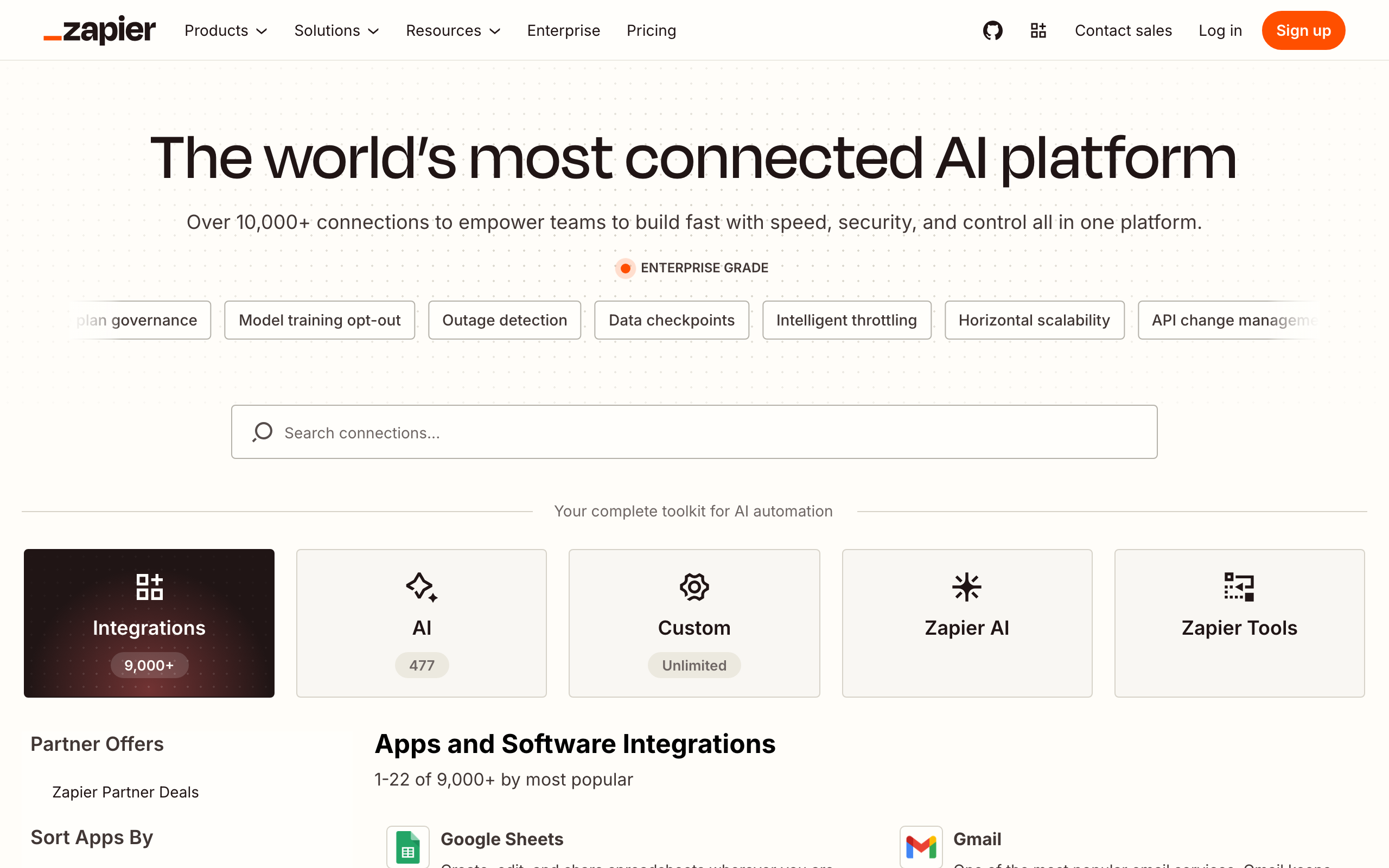 The Zapier app directory showing logos of popular marketing tools like Slack, Google Sheets, and Mailchimp.